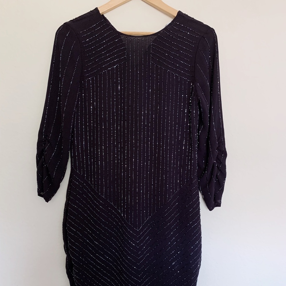 Jenifer Lopez beaded deep purple dress